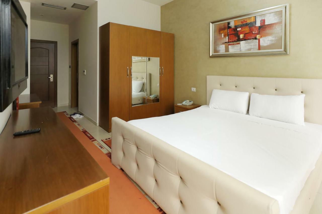 Hotel Gjuta Тирана Экстерьер фото