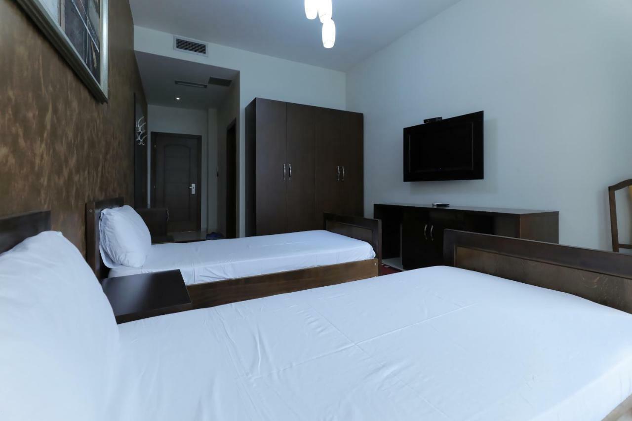 Hotel Gjuta Тирана Экстерьер фото